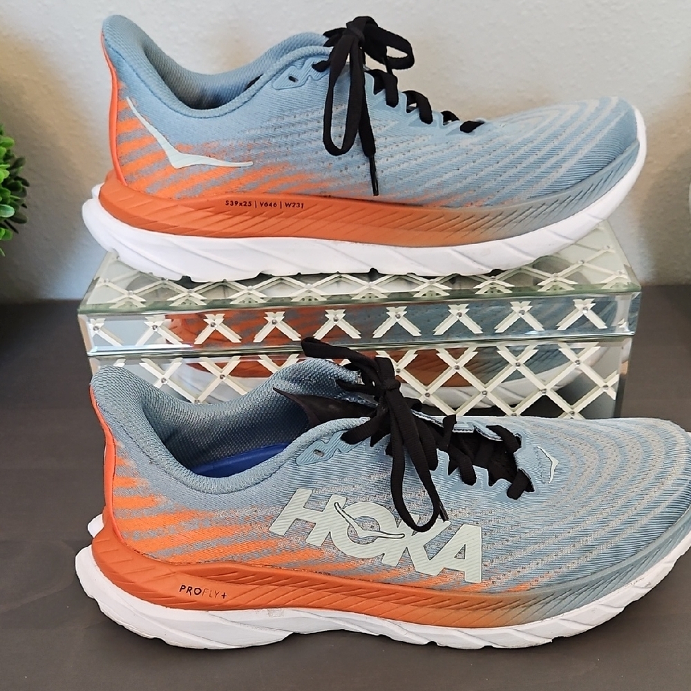 Hoka Light Blue and Orange Athletic Shoes
